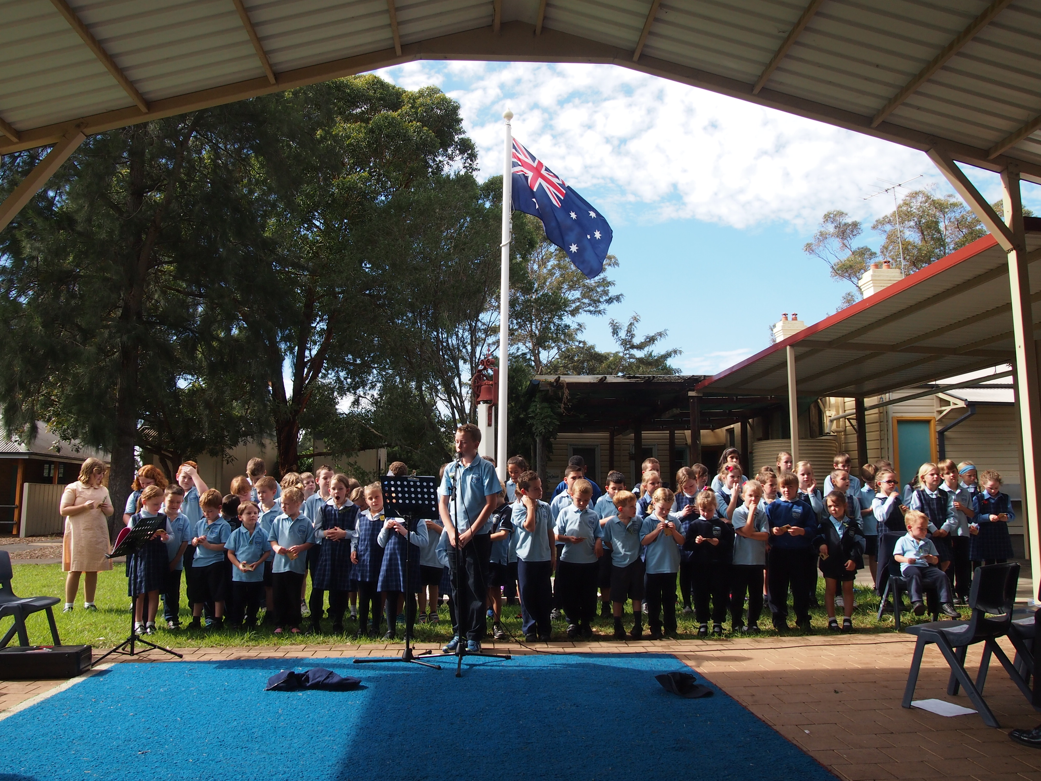 The school performing at our service. 